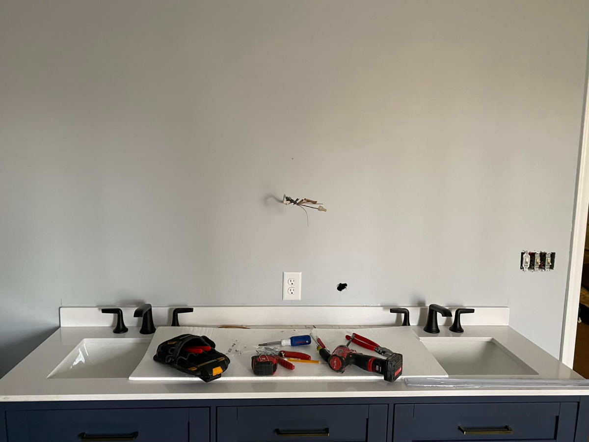 Burnt electrical outlet repaired by Monday Electric